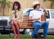 Jared Leto and McConaughey sit on a park bench together. 