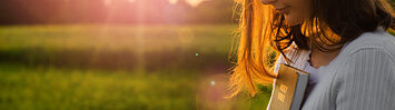 Christian girl holding bible